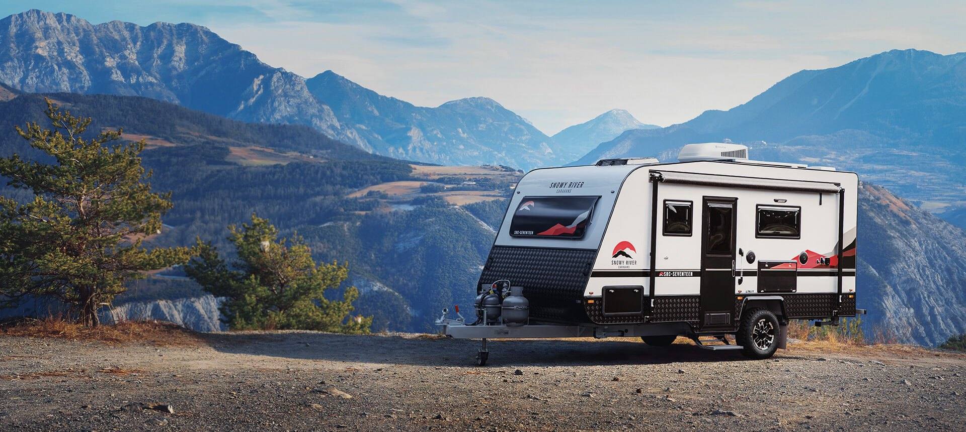 Snowy River SRC-17 off-road caravan parked at a mountain lookout, manufacturer photograph.